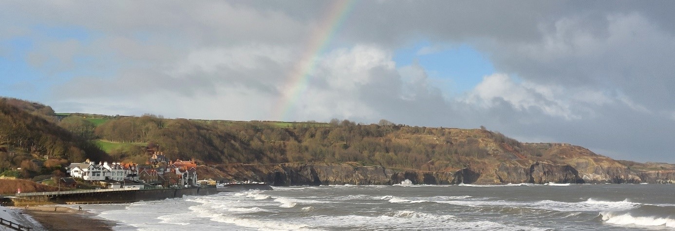 englische Küste Regenbogen