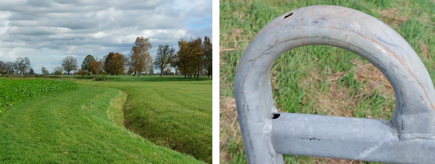 Feld grün und Saftig mit Bäume, Wolken und Metallrohr